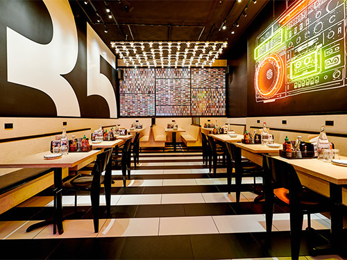 Fashion District burger joint offers welcoming and relaxing atmosphere to enjoy delicious craft burgers and beer.