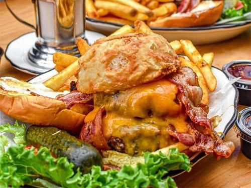 Double cheeseburger with bacon at our hamburger restaurant near Union Square East, New York City.