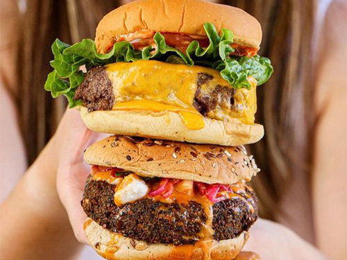 Two burgers on top of one another at our burger joint near Union Square, NYC.