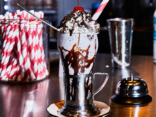 Classic 12 South, Nashville shake with whipped cream, chocolate syrup, and a cherry on top.