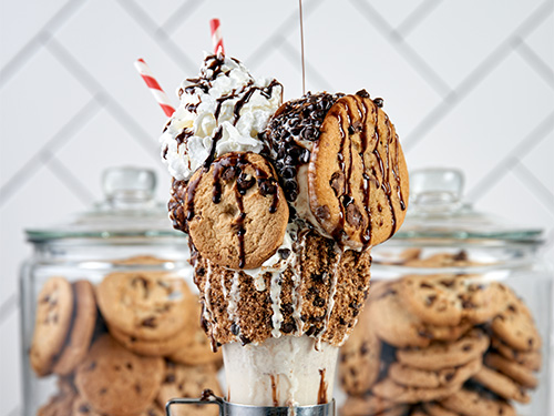 Close up view of the Bowery Cookie Shake with cookie jars behind it.