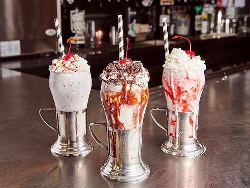 Three of our Broadway, NYC shakes: Vanilla, Oreo Cookies 'N Cream, and Strawberry.