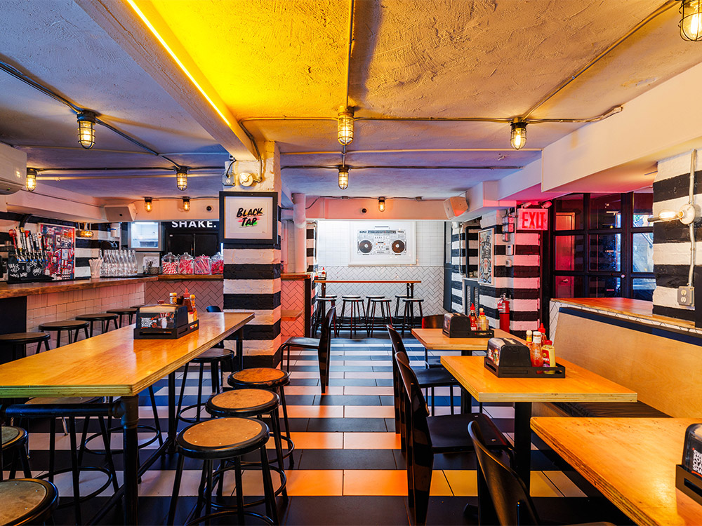 View of bar and dining room at our holiday party venue near Bowery, New York City.