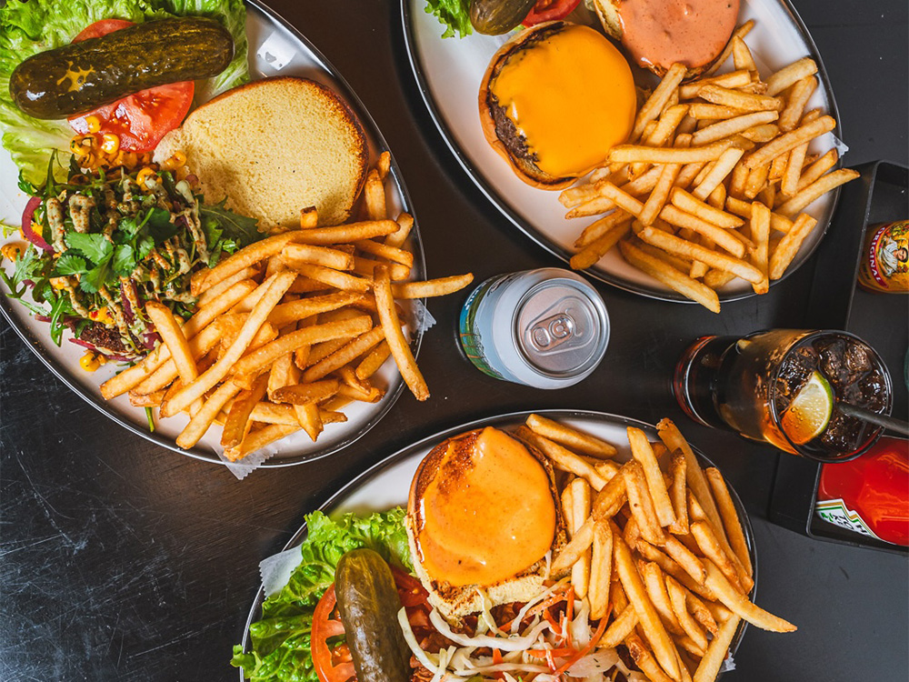 Burgers and fries prepared at our Maryland, London, UK burger spot.