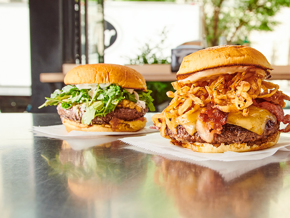 The Champ burger next to the Wagyu Steakhouse Burger, two of our wagyu beef burgers near Maryland, London, UK.