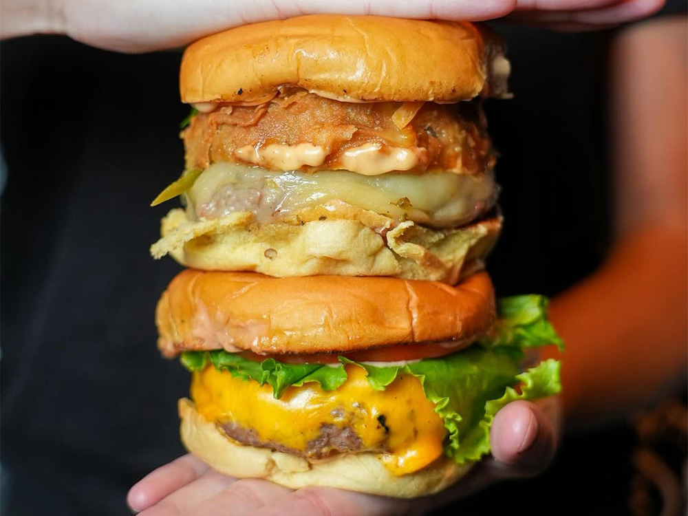 Tasty gourmet wagyu burger near Meatpacking District, Manhattan prepared by Black Tap.