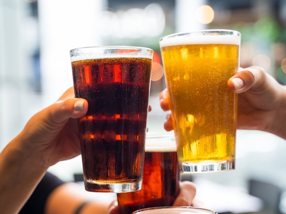 Glasses of beer at our spot for football championship watch parties near Broadway, Nashville, TN.